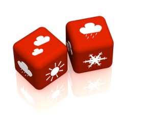Two cubes with symbols of weather forecast